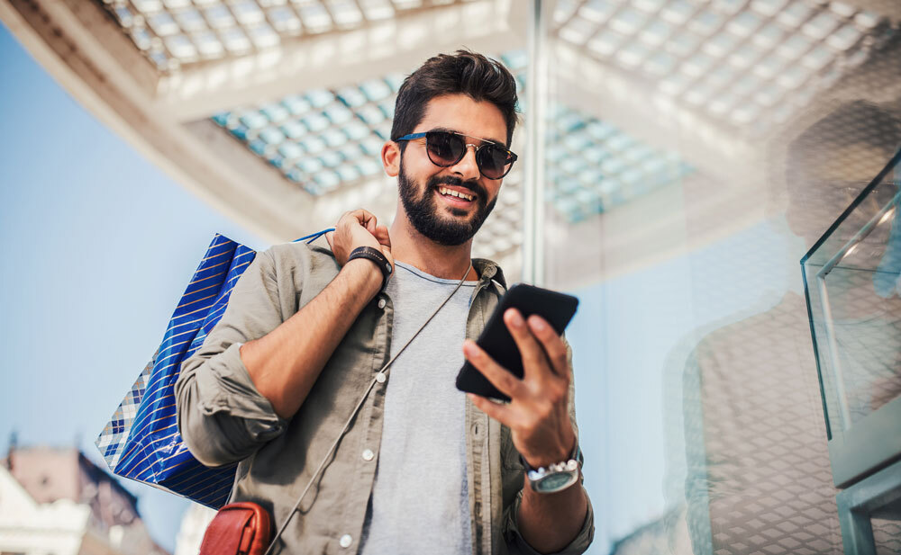 man looking at his phone